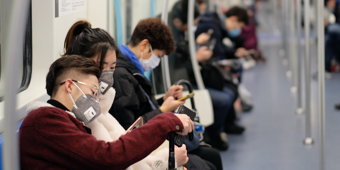Chinese commuters wearing a mask amid the coronavirus outbreak