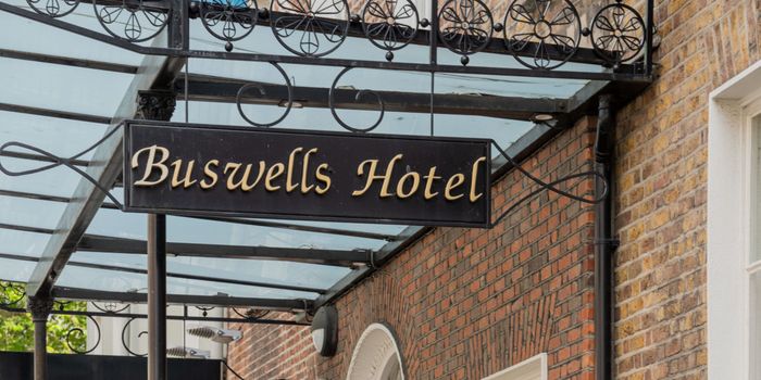 sign for buswells hotel in dublin