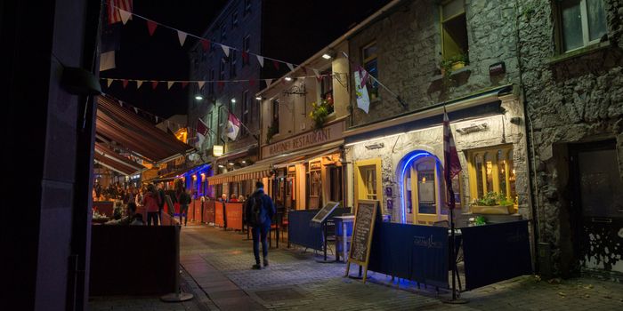 shot of pubs and restaurants on a street in Galway city