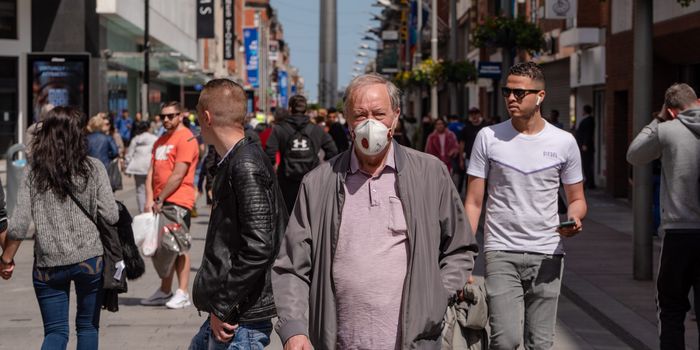 shoppers on Henry Street in Dublin, one man wearing mask