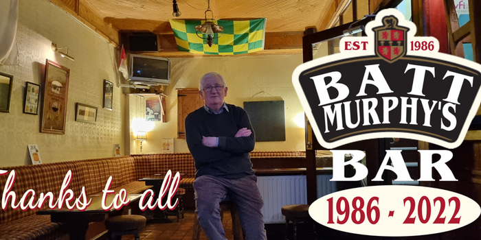 man standing in an empty pub, arms folded, with the Batt Murphys logo on the right hand side of the image and "thanks to all!" written on the bottom