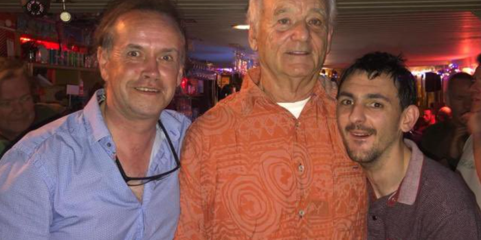 Bill Murray smiling for a photo in a Limerick pub