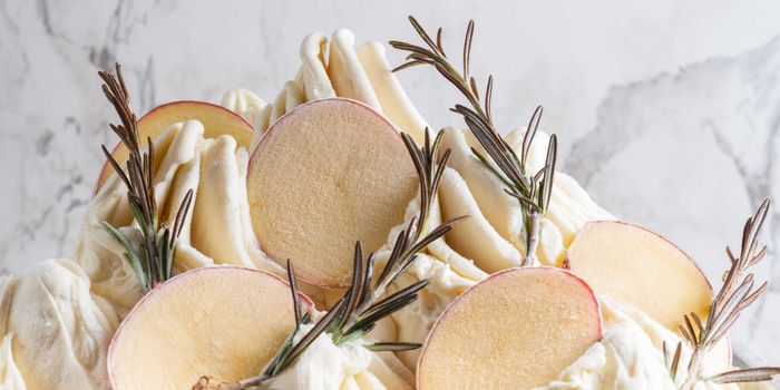 potato ice cream, topped with rosemary sprigs and thinly sliced spuds