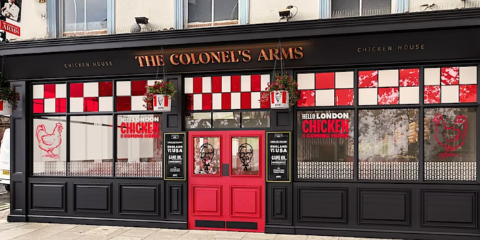 exterior of 'the colonel's arms' a pub decorated with kfc branding