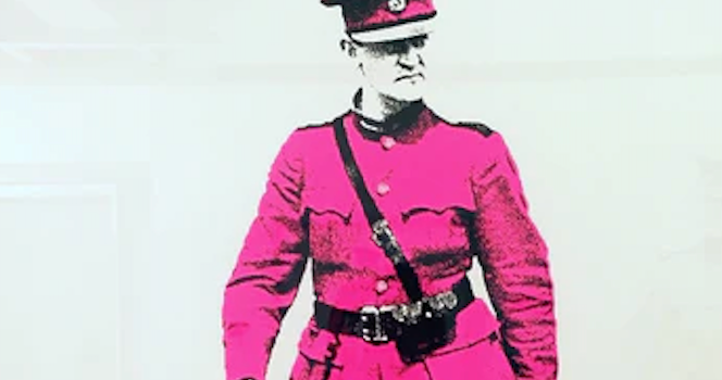A print of Michael Collins wearing a pink suit and hat
