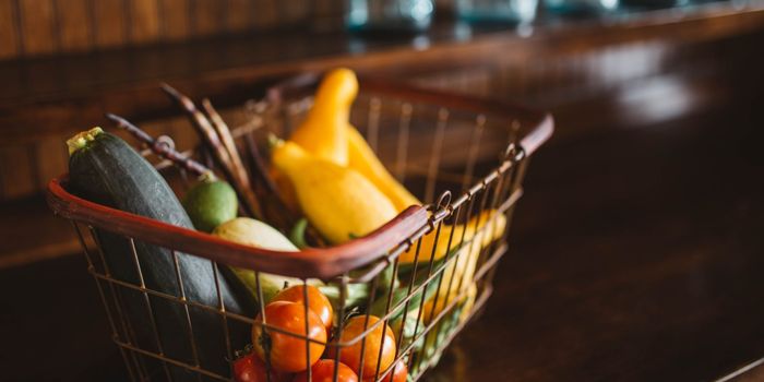 basket of food including fresh fruits and veg